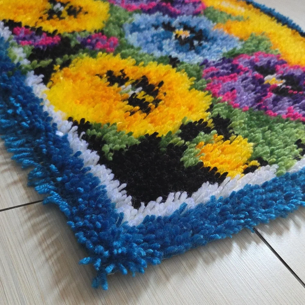 Completed Caron Wonderart Pot of Pansies Rug